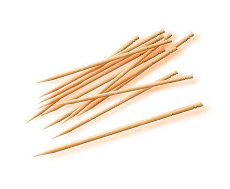 palillos de madera y metal insertados en carne para asar