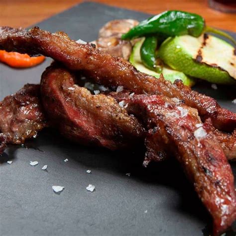 Plato de lagarto ibérico servido en La Mariseca