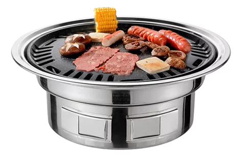 Mesa de barbacoa coreana con parrilla central