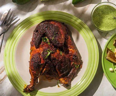 Pollo asado al estilo peruano con salsa verde