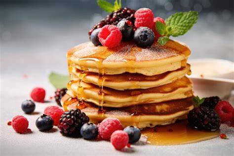 Tortitas con sirope de arce y frutos rojos