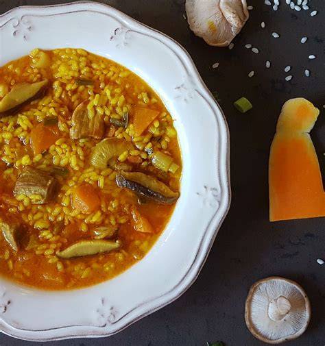 Arroz caldoso de calabaza con secreto y setas