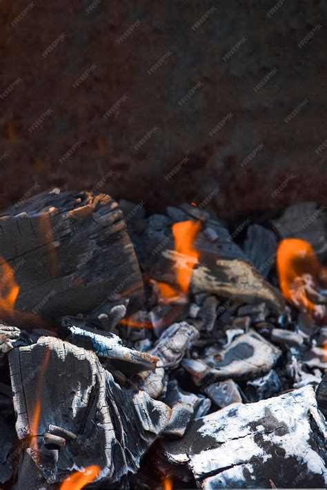 Disposición de brasas para churrasco