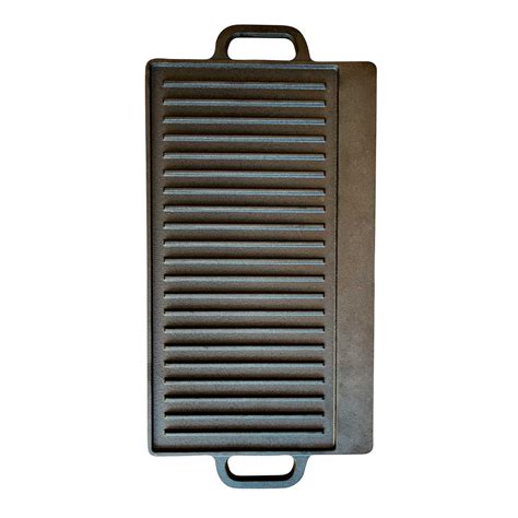 Plancha de hierro fundido siendo limpiada
