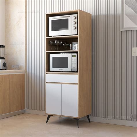 Muestra de diferentes estilos de muebles de microondas (madera, negro, blanco)