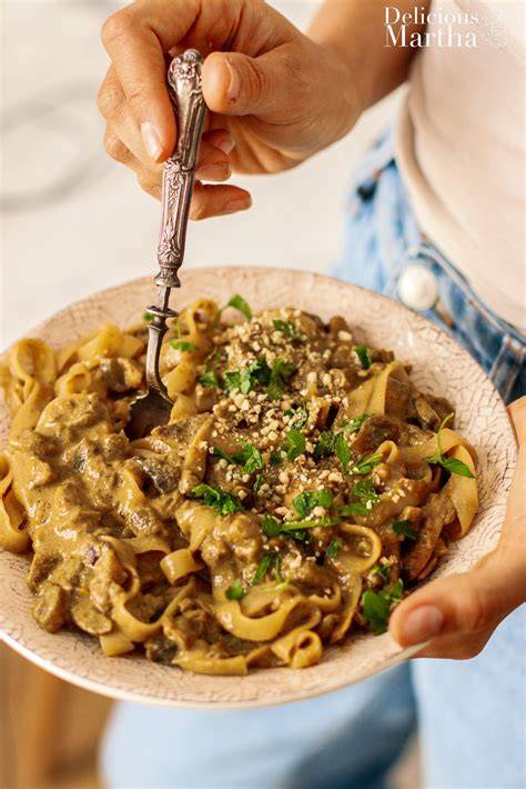 Tallarines con setas y salsa de curri