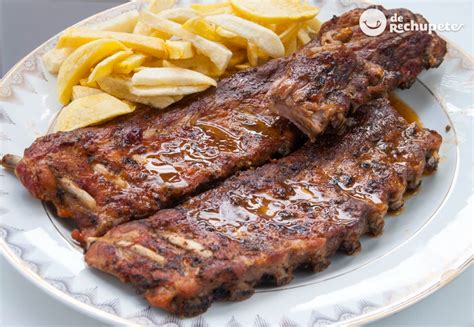 Plato de costillas fritas con guarnición