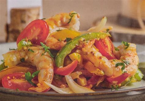 Sartén con langostinos y tomates cherry