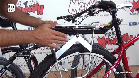 Portabultos de tija instalado en una bicicleta