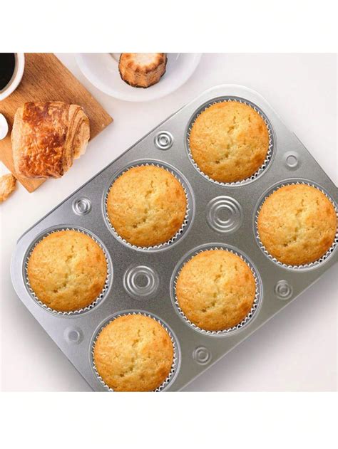 Bandeja de muffins horneándose