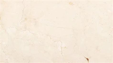 Ejemplos de texturas y vetas en el mármol Crema Marfil