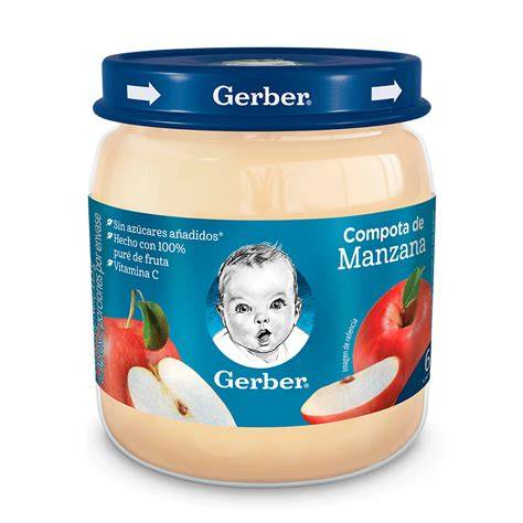 Bebé comiendo compota de manzana