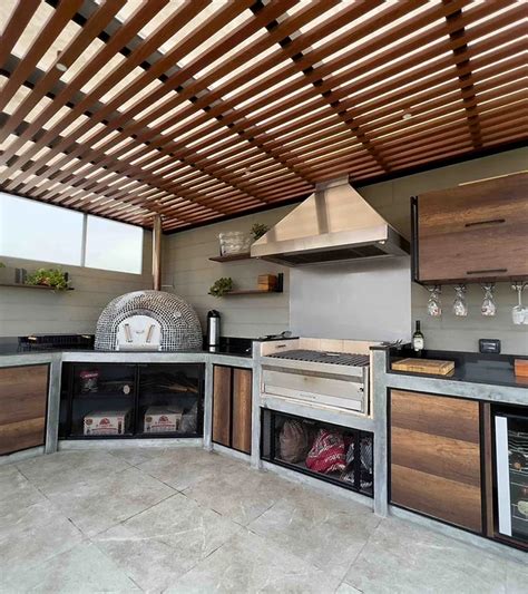 Terraza exterior de Apartamentos La Parrilla ideal para comer al aire libre