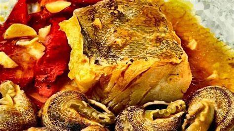 Bacalao con Caracoles y Pimientos del Piquillo