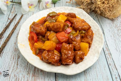 Cerdo agridulce con verduras y arroz