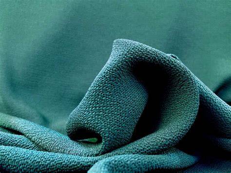 Textura de cerca del tejido crepé Georgette