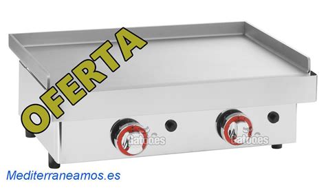 Plancha de asar a gas butano en uso