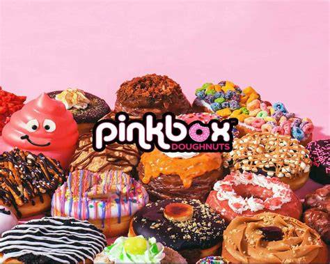 Variedad de donas coloridas en Pinkbox Doughnuts