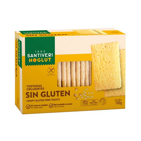 Variedad de tostadas gourmet sin gluten sobre una mesa de madera