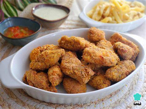 Infografía comparando chicharrón de pollo y nuggets