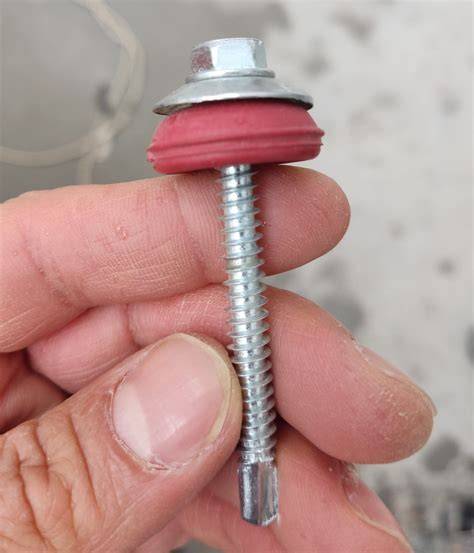 Tornillo de fijación autoperforante con cabeza de goma de caucho