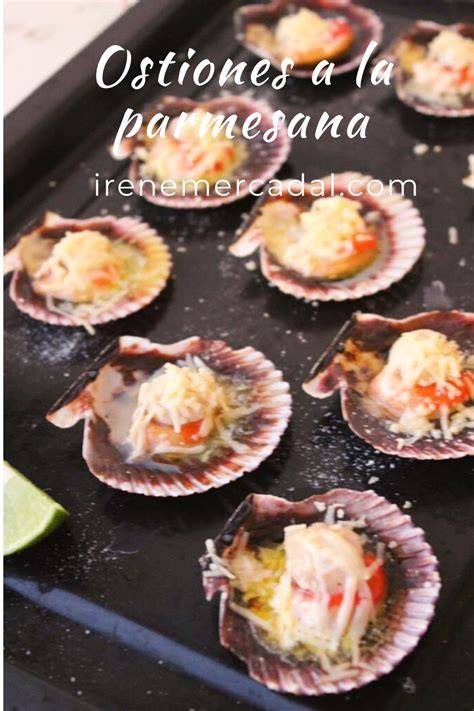 Plato de ostiones a la parmesana servidos en sus conchas
