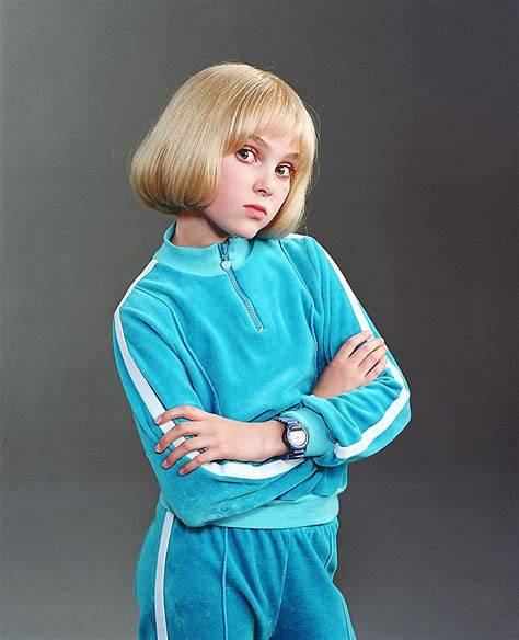 Violet Beauregarde transformada en arándano