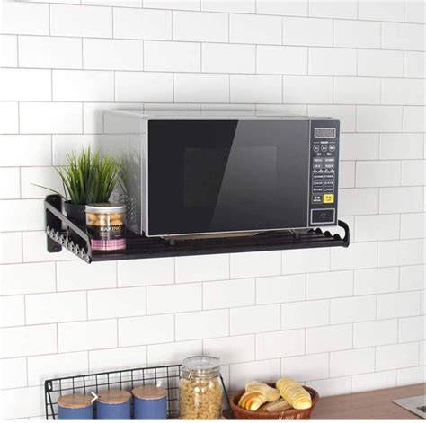 Microondas instalado en soporte de pared de acero inoxidable