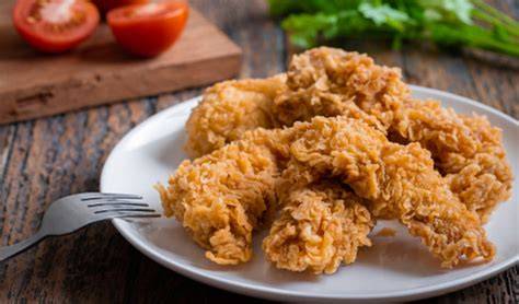 Pollo rebozado con avena horneado