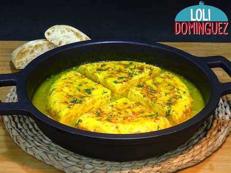 Tortilla de patatas guisada en salsa con pan