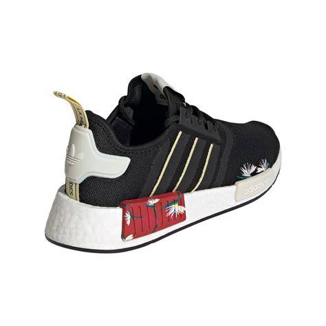 Zapatillas Adidas NMD_R1 con sus características principales señaladas