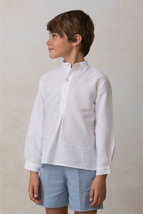 Niño con bermudas de lino rosa y camisa cuello mao