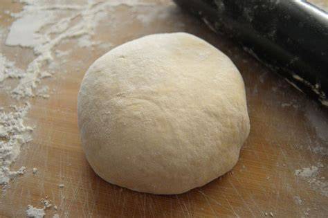 Masa de pizza con textura lisa y suave