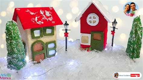 Variedad de casas navideñas hechas con bricks de leche