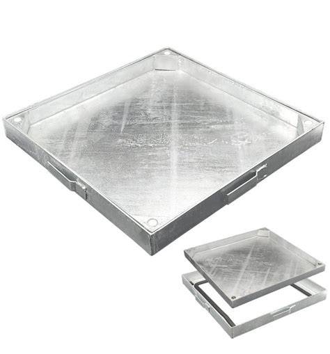 Tapa de arqueta rellenable instalada en un pavimento