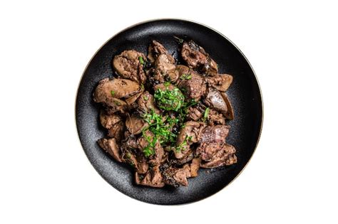 Cordero frito con ajo y perejil en un plato