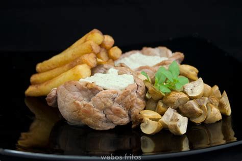 Plato de trenza de cerdo con salsa de Cabrales