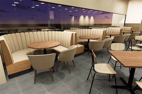 Interior del restaurante Asador De Pollos Centro con mesas y sillas