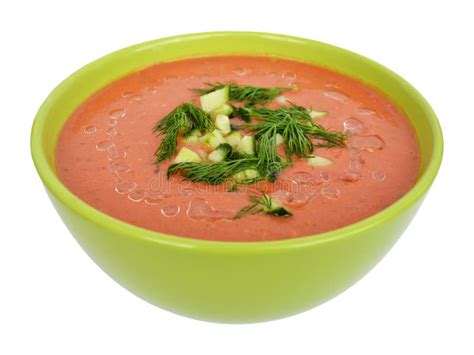 Gazpacho amarillo en un cuenco con guarnición