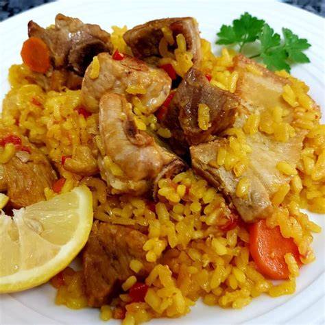 Arroz con pollo y cerdo