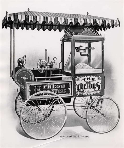 Máquina antigua de palomitas de Charles Cretors junto a una moderna