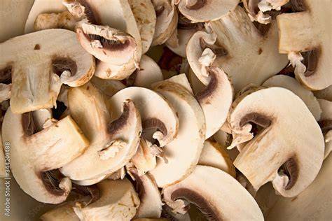 Champiñones Portobello cortados en láminas