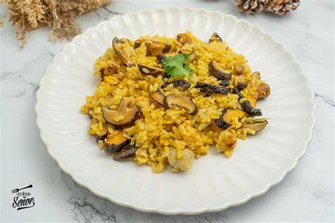 Arroz con sepia y setas shiitake emplatado