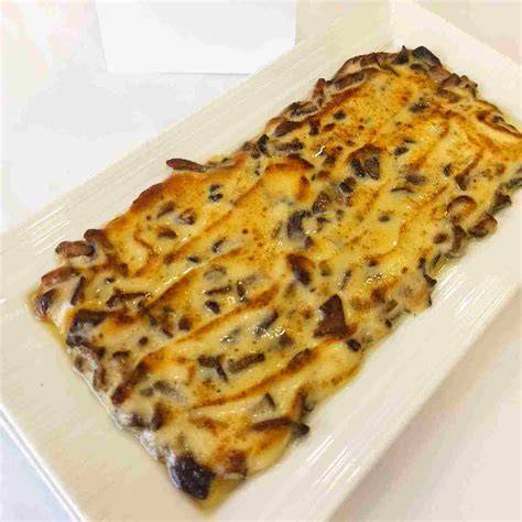 Setas gratinadas con alioli
