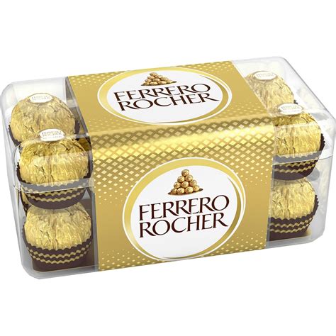 Primer plano de bombones Ferrero Rocher y Lindor dentro de una caja de madera