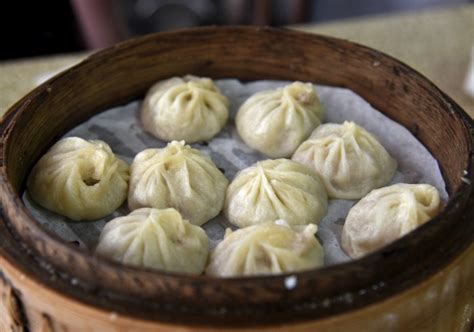 Infografía comparativa de diferentes tipos de dumplings asiáticos