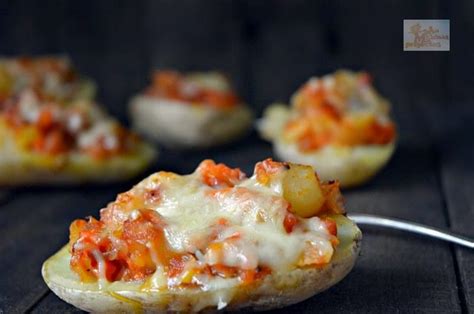 Patatas rellenas listas para gratinar