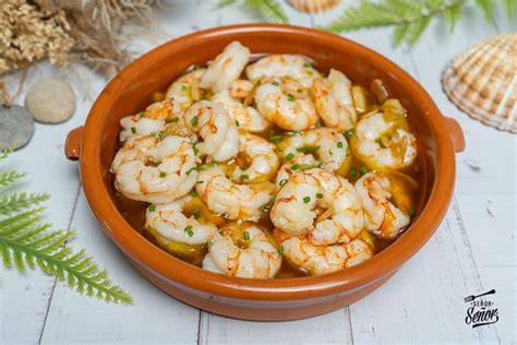 Preparación de gambas al ajillo