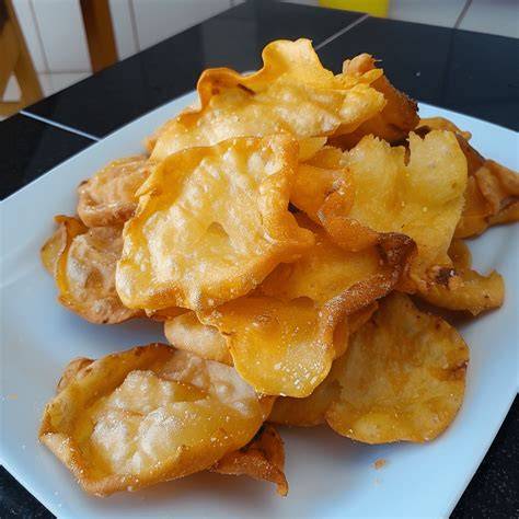 Hojaldras recién fritas y espolvoreadas con azúcar