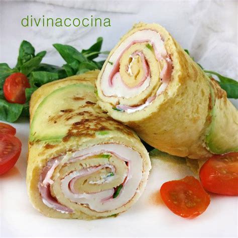 Rollitos de tortilla rellenos de rúcula y queso de cabra